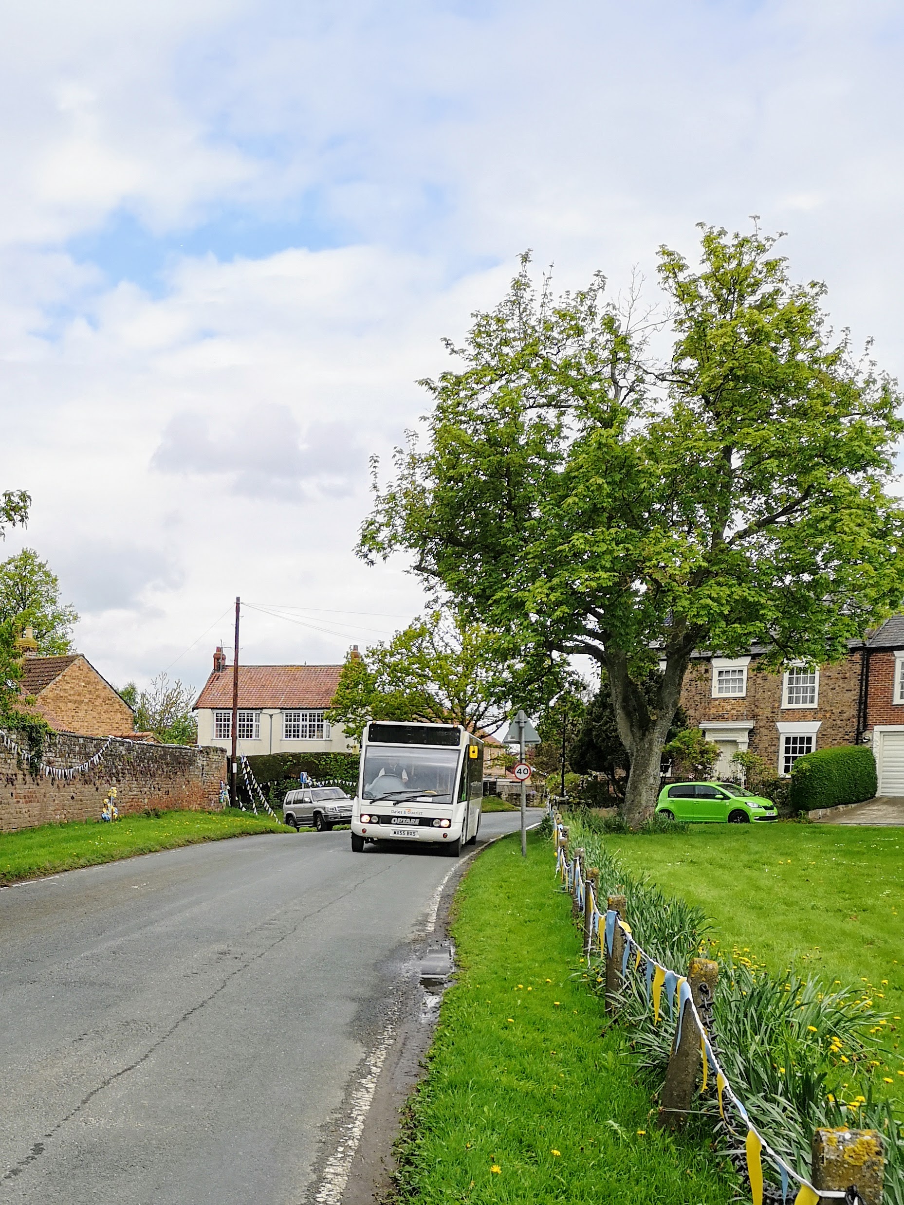 The 144 service approaches Exelby Green...