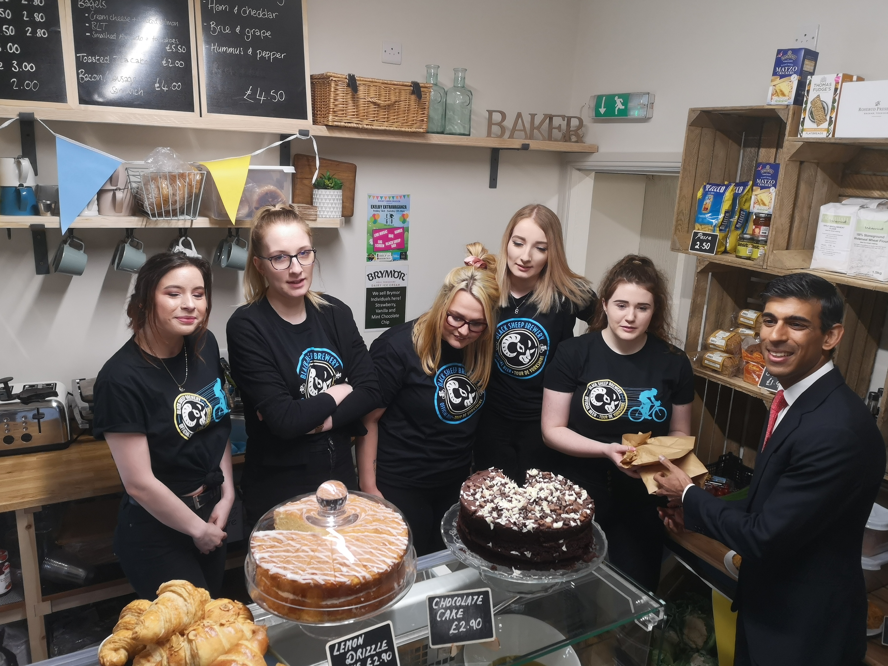 Rishi Sunak MP checks out Exelby Deli Café This job is not a piece of cake...